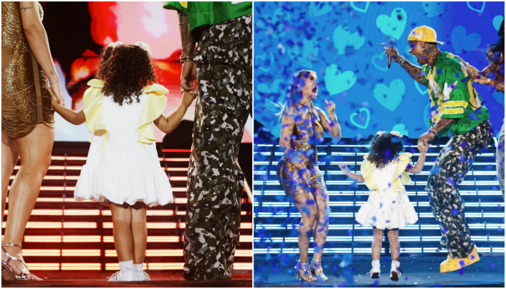 A dançarina Lore Improta e o cantor Leo Santana descobriram que esperam um menino durante o show que comemorou 20 anos de carreira dele.